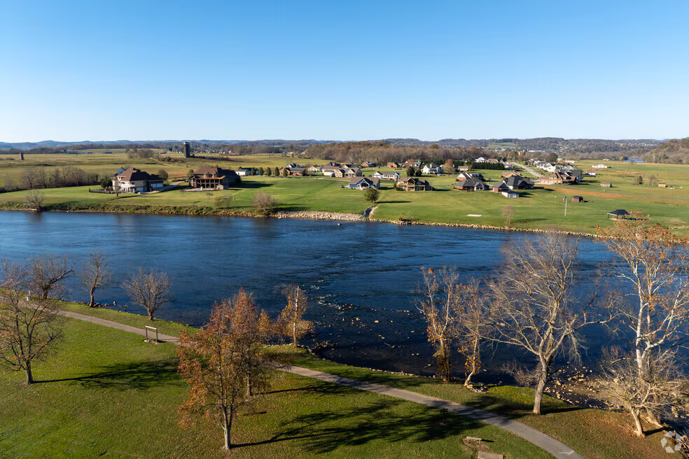 Greeneville, TN drone photography looking over downtown Greeneville with Blue Ridge Mountains in the distance